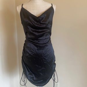 Satin black slip dress with ruched sides